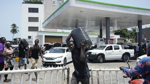 Faced with a shortage, Nigerians queue for hours for petrol as prices soar