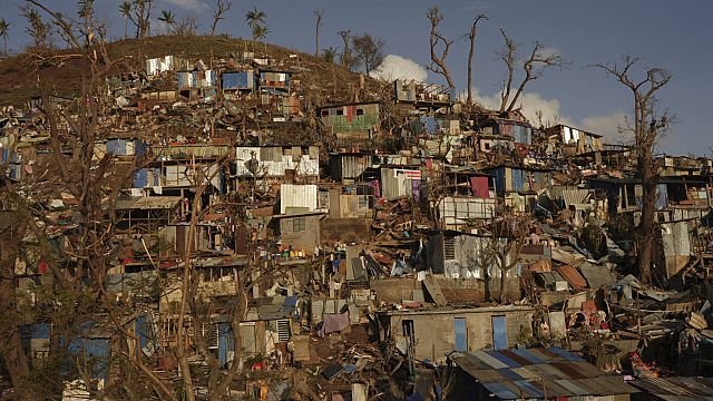 Macron surveys cyclone damage in Mayotte