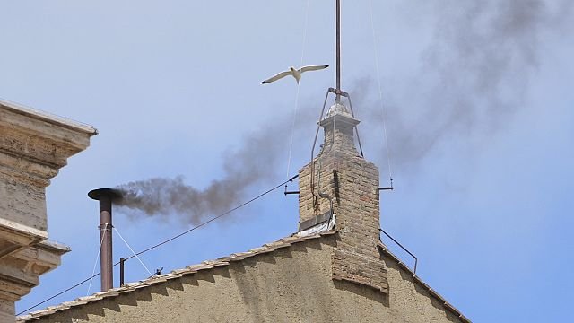 No new pope as black smoke also rises at midday on second day of conclave