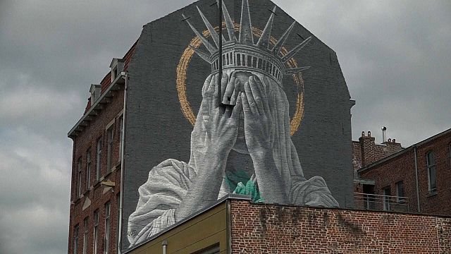 Giant mural in France critiques Trump’s immigration policies