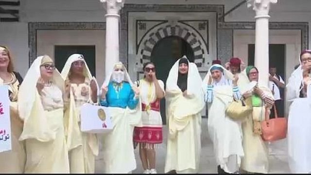 Tunisia’s Women’s Day parade celebrates the traditional sefsari tunic