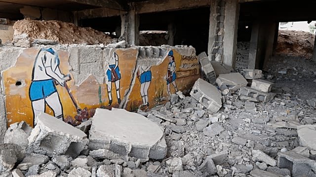 One year after fall of Assad, Syrians struggle to rebuild the country