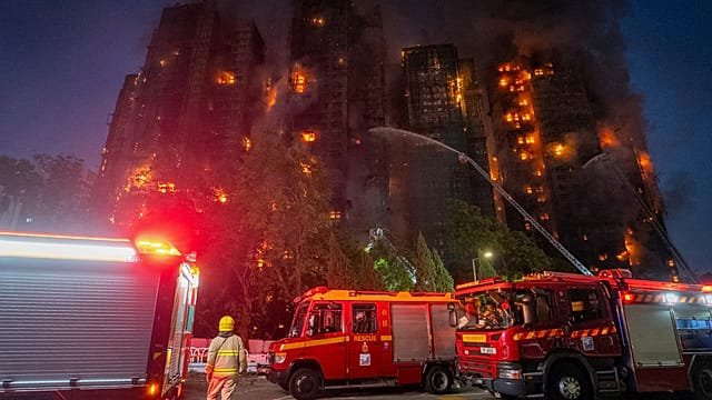 At least 36 dead and hundreds missing in Hong Kong buildings blaze