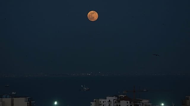 Beaver supermoon rises over Senegal’s capital Dakar
