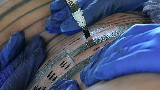 Researchers find evidence of youngest-ever children tattooed