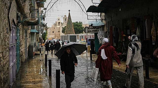 Christmas hymns return to Bethlehem after ceasefire brings brief respite