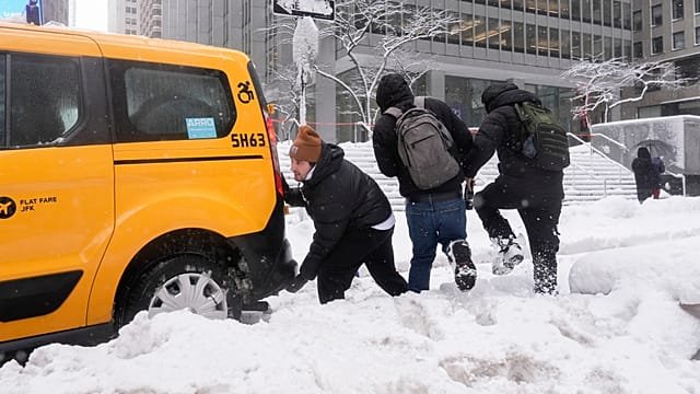 New York buried in nearly 60 centimetres of snow as Manhattan falls silent
