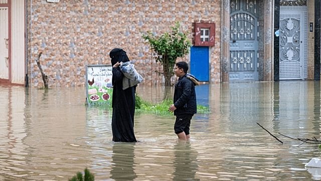 Moroccan security forces carry out evacuations as floods hit north