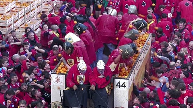Streets of Ivrea explode with flying oranges in a three-day carnival revolt