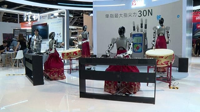 Humanoid robots box and perform at Hong Kong AI and robotics fair