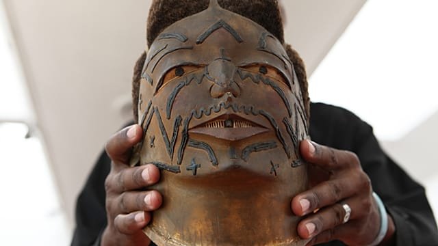 South Africa returns looted Zimbabwean remains and sacred artefact