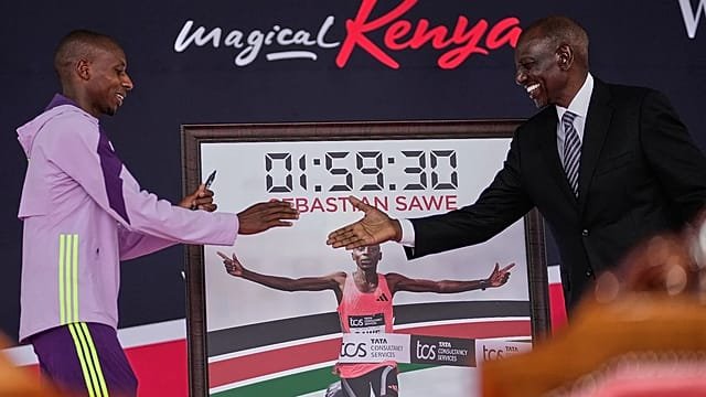 Kenya’s President William Ruto hosts marathon record breaker Sawe