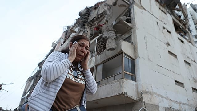 Race to rescue survivors trapped under rubble after twin quakes in Venezuela