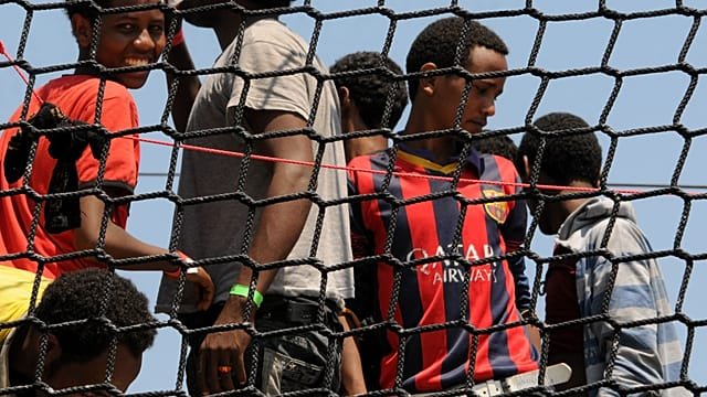 Migrant workers struggle to survive as Southern Italy bakes