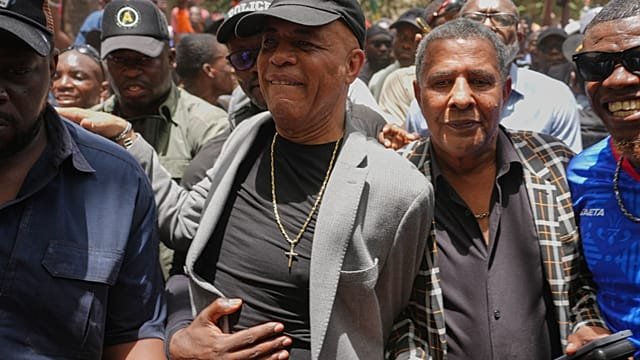 Former Haitian president expected to testify in court on rare visit home