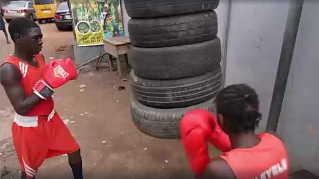 Nigerian youngsters learning boxing on the streets of Lagos