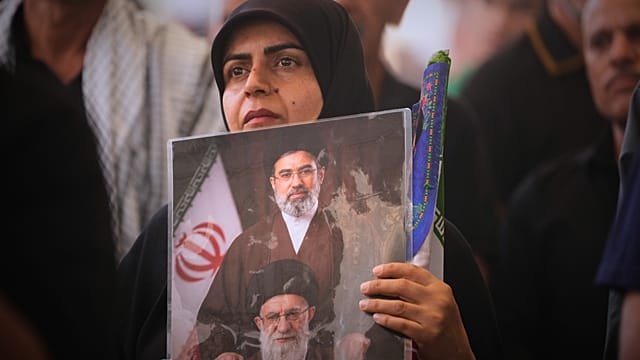 Iran’s supreme leader vows revenge for the killing of his father and predecessor