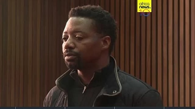 Man sought in killings of family in UK remains in custody in South Africa