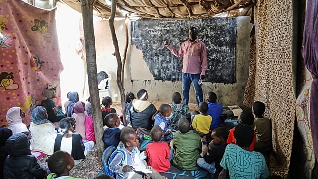Refugee teacher fights to keep education alive for children displaced by Sudan’s war