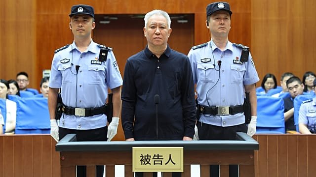 Chinese court sentences founder of troubled property developer Evergrande to life in prison