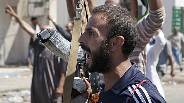 Mass prison escape as armed clashes rock western Libya