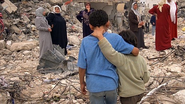 Palestinians in Gaza remain wary as Israeli strikes ease